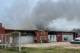Investigan las causas de un incendio que destruyó un sector de un taller mecánico y afectó a un auto en Santa Rosa